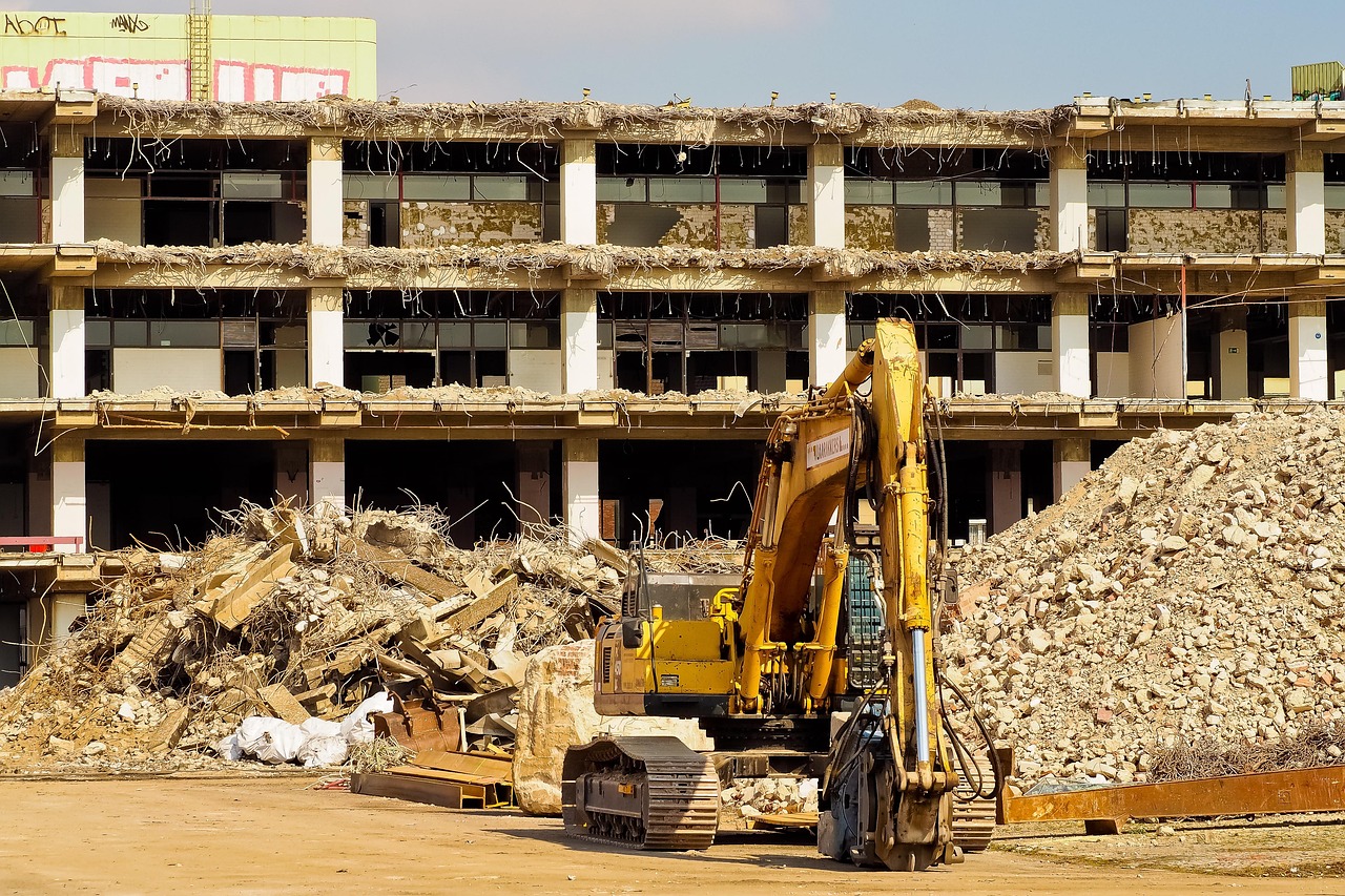 Excavator grading a lot in the Waco area